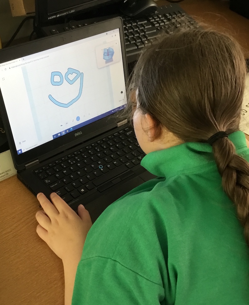 A girl uses the scribble tool in Tinkercad