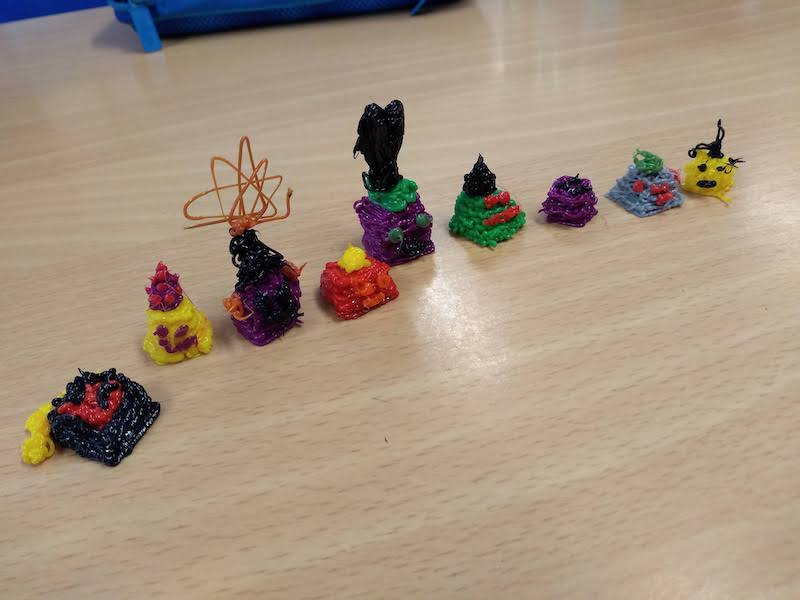 3D pen layers stacked up and little faces added
